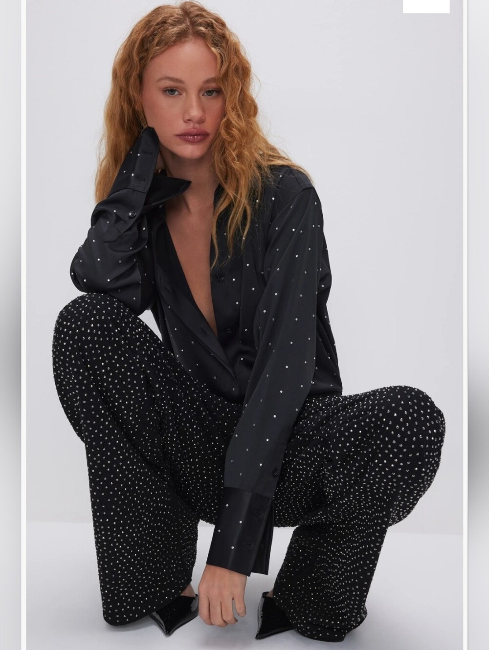Good Ease Rhinestone Wide Leg Jeans
Good American.